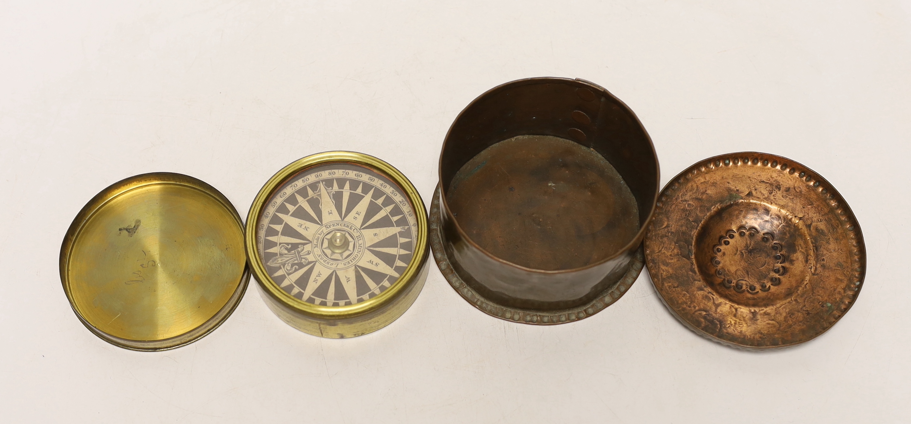 A small circular John Pearson copper box, stamped on base, together with a compass, Pearson box 10cms diameter